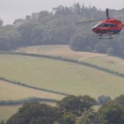 Air ambulance landed at Dawlish Water/ St Gregory's church today.